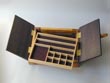 Temple jewelry box with both doors open and tray partially removed